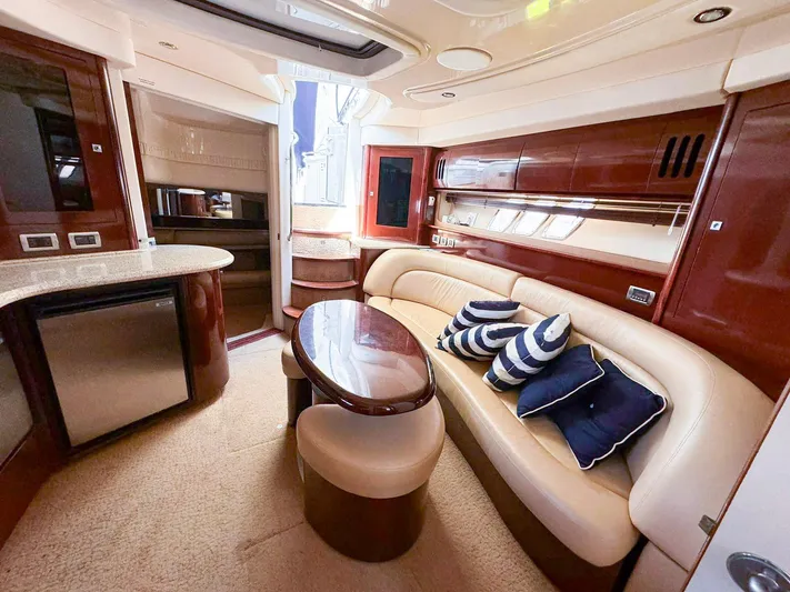 The Boardroom Yacht Photos Pics Luxurious 2008 Sea Ray Sundancer yacht interior with plush seating and elegant design.