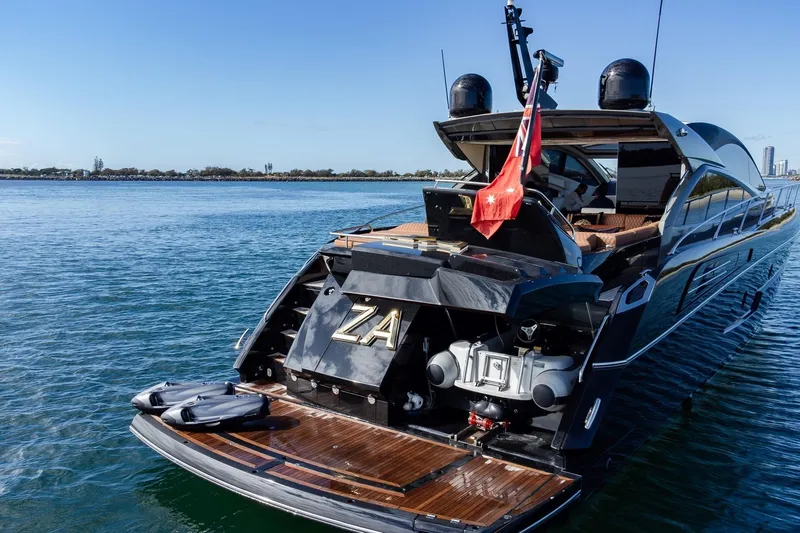 Zaza Yacht Photos Pics Luxury Sunseeker Predator 68 yacht, 2013 model, docked on calm waters.