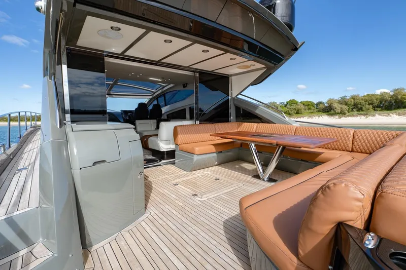 Zaza Yacht Photos Pics Luxurious 2013 Sunseeker Predator 68 yacht with spacious outdoor seating and elegant design.