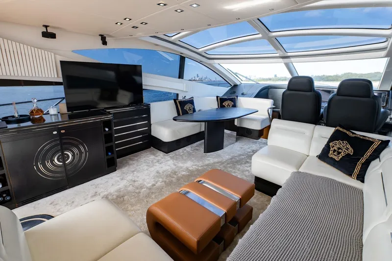 Zaza Yacht Photos Pics Luxurious interior of 2013 Sunseeker Predator 68 yacht with modern furnishings and panoramic windows.