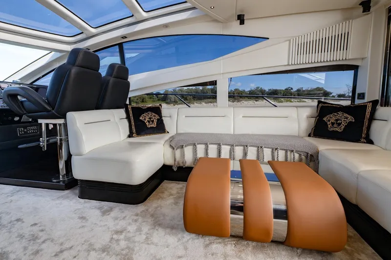 Zaza Yacht Photos Pics Luxurious interior of 2013 Sunseeker Predator 68 yacht with plush seating and modern design.