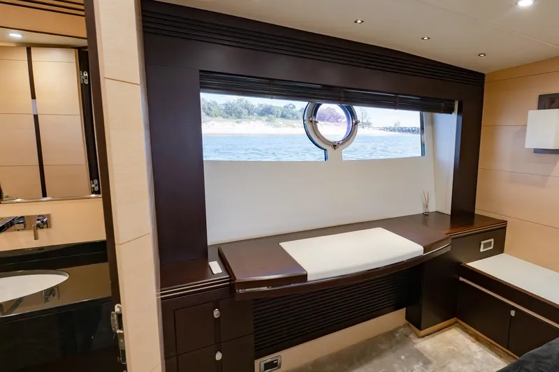 Zaza Yacht Photos Pics Luxurious interior of 2013 Sunseeker Predator 68 yacht with elegant wood finishes and ocean view.