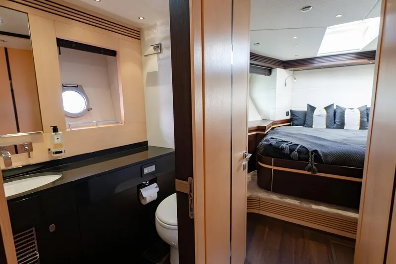 Zaza Yacht Photos Pics Luxurious 2013 Sunseeker Predator 68 yacht interior with bedroom and bathroom.