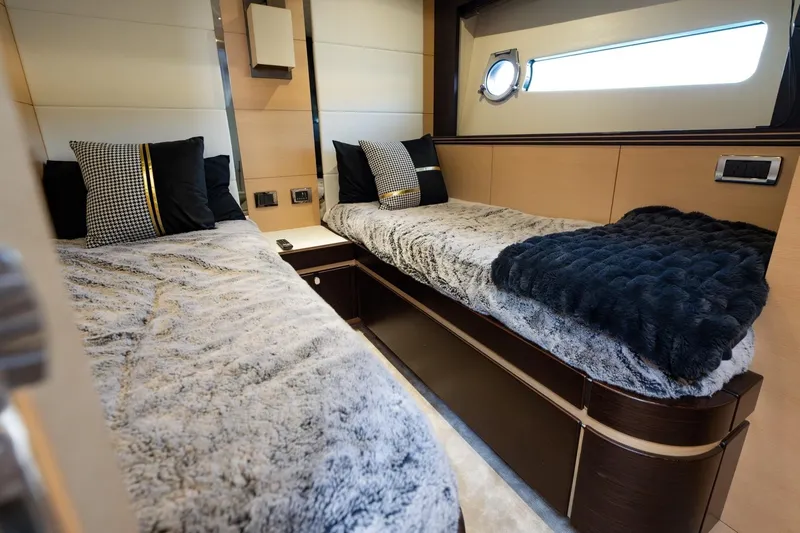 Zaza Yacht Photos Pics Luxurious twin cabin interior of 2013 Sunseeker Predator 68 yacht with plush bedding.