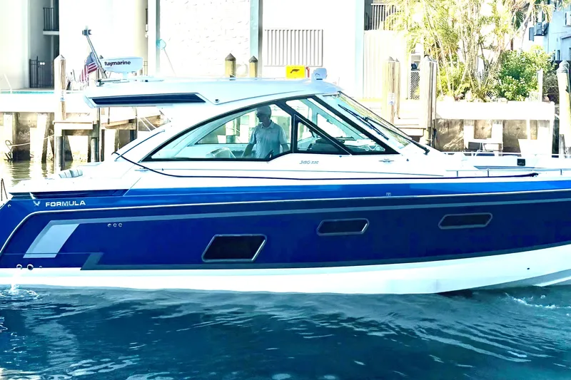  Yacht Photos Pics 2023 Formula 380 Super Sport Crossover OB boat on water, side view.