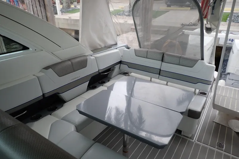  Yacht Photos Pics 2023 Formula 380 Super Sport Crossover OB interior with sleek seating and modern table design.