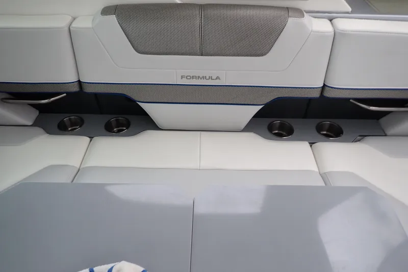  Yacht Photos Pics 2023 Formula 380 Super Sport Crossover OB interior seating with cup holders and sleek design.