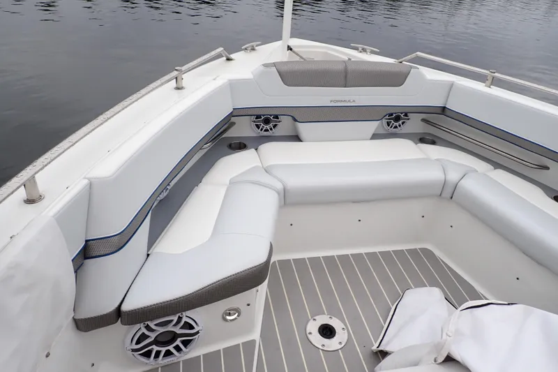  Yacht Photos Pics 2023 Formula 380 Super Sport Crossover OB boat interior with cushioned seating and speakers.