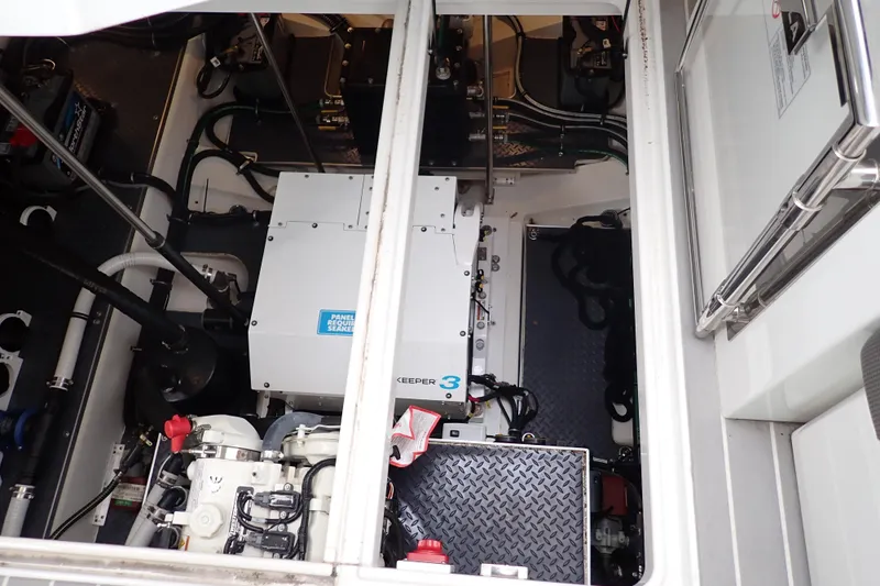  Yacht Photos Pics Engine compartment of 2023 Formula 380 Super Sport Crossover OB, showcasing mechanical components.