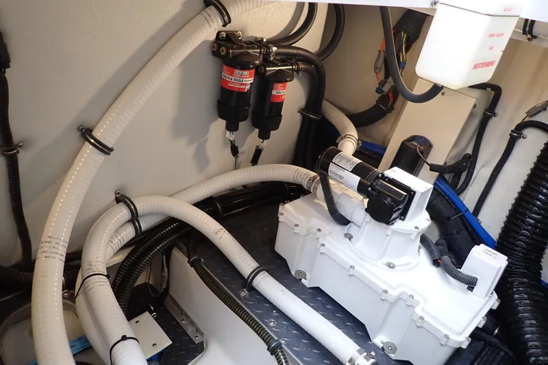  Yacht Photos Pics Engine room of 2023 Formula 380 Super Sport Crossover OB with hoses and components.