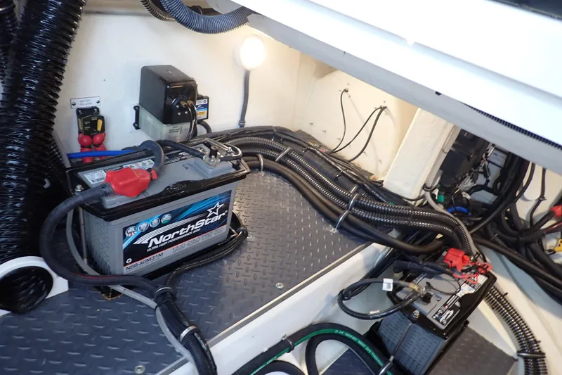  Yacht Photos Pics Engine compartment of 2023 Formula 380 Super Sport Crossover OB with batteries and wiring.
