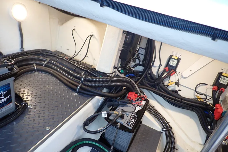  Yacht Photos Pics Engine compartment of 2023 Formula 380 Super Sport Crossover OB with wiring and battery setup.