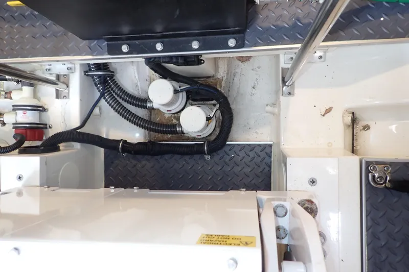  Yacht Photos Pics Engine compartment of 2023 Formula 380 Super Sport Crossover OB with visible wiring and components.