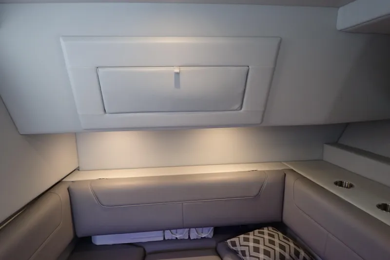  Yacht Photos Pics 2023 Formula 380 Super Sport Crossover OB cabin interior with seating and storage.