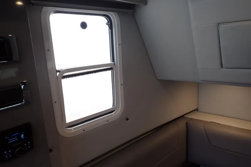  Yacht Photos Pics Interior cabin of 2023 Formula 380 Super Sport Crossover OB with window and seating.