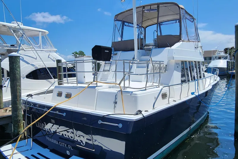  Yacht Photos Pics 2003 Mainship 43 Trawler Aft Cabin docked in Panama City marina.