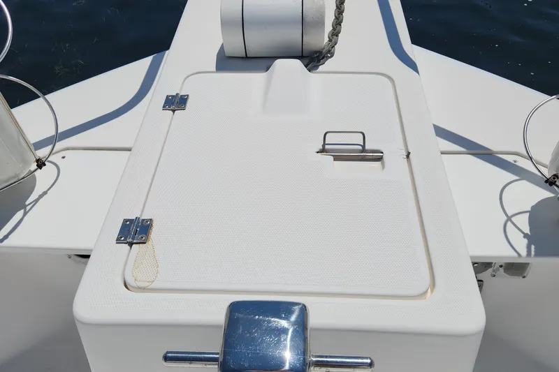  Yacht Photos Pics 2003 Mainship 43 Trawler Aft Cabin deck with hatch and anchor chain.