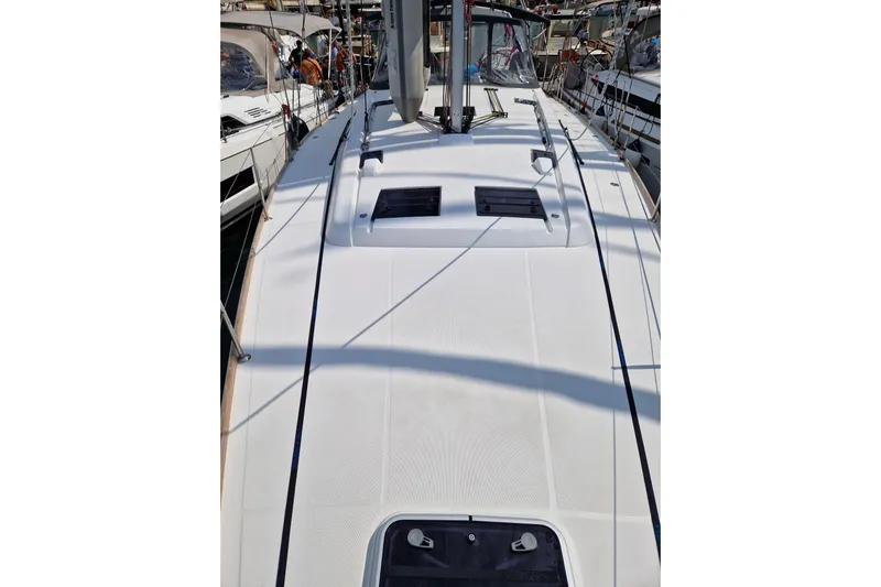  Yacht Photos Pics 2014 Beneteau Oceanis 48 yacht deck, showcasing sleek design and spacious layout.