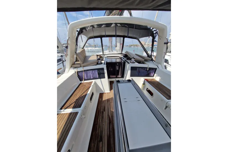  Yacht Photos Pics 2014 Beneteau Oceanis 48 yacht cockpit with seating and navigation equipment.