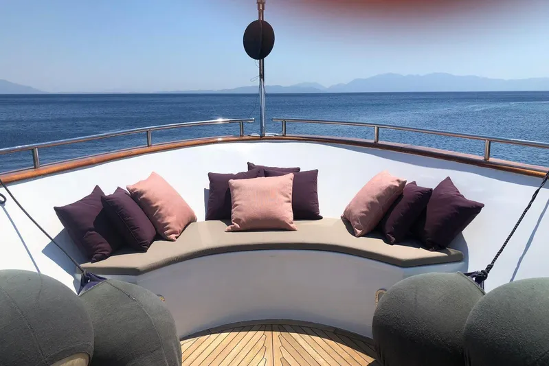Axella Yacht Photos Pics Luxurious seating area on 1991 Crestitalia 33m yacht with ocean view.