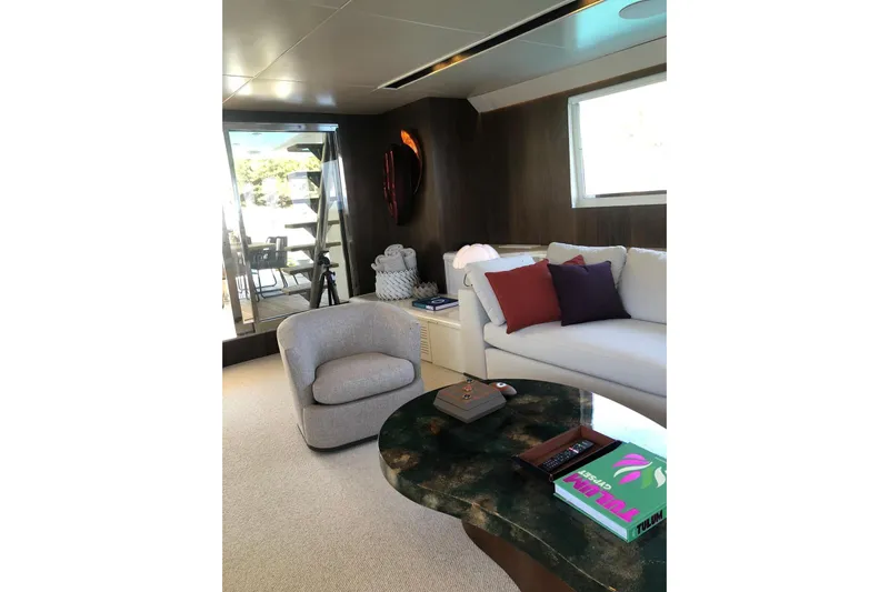 Axella Yacht Photos Pics Luxurious interior of 1991 Crestitalia 33m yacht with modern furnishings and decor.