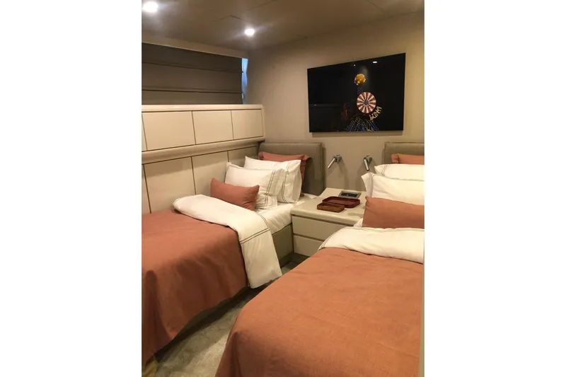 Axella Yacht Photos Pics Luxurious twin bedroom on 1991 Crestitalia 33m yacht with modern decor.