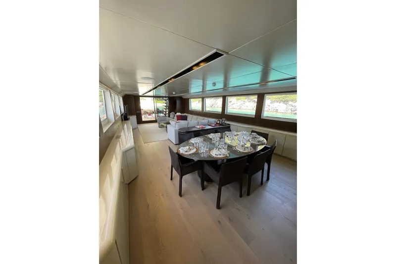 Axella Yacht Photos Pics Luxurious interior of 1991 Crestitalia 33m yacht with elegant dining area.