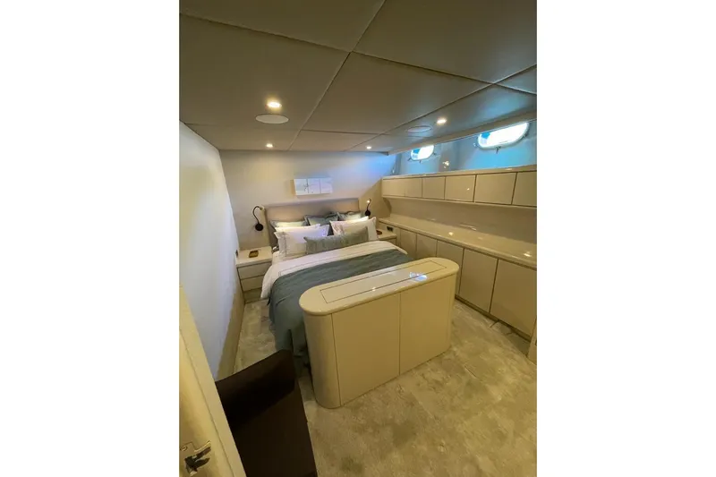 Axella Yacht Photos Pics Luxurious bedroom interior on 1991 Crestitalia 33m yacht with modern furnishings.