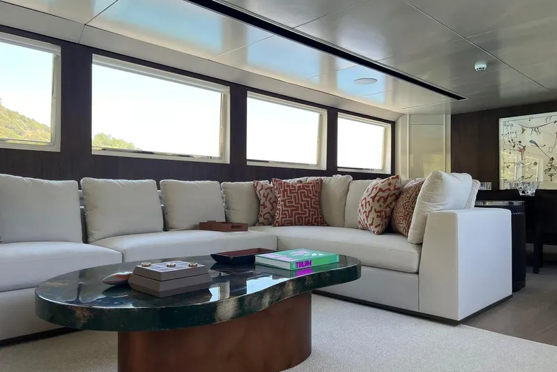 Axella Yacht Photos Pics Luxurious interior of 1991 Crestitalia 33m yacht with elegant sofa and modern decor.