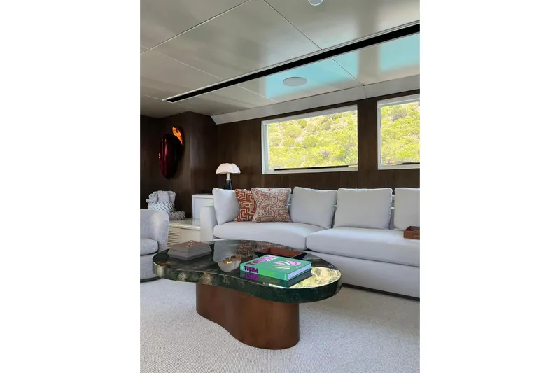 Axella Yacht Photos Pics Luxurious yacht interior with modern decor, featuring a Crestitalia 33m model from 1991.