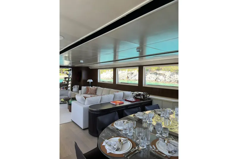 Axella Yacht Photos Pics Luxurious interior of 1991 Crestitalia 33m yacht with elegant dining and seating area.