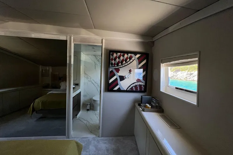 Axella Yacht Photos Pics Luxurious interior of 1991 Crestitalia 33m yacht with modern decor and ocean view.