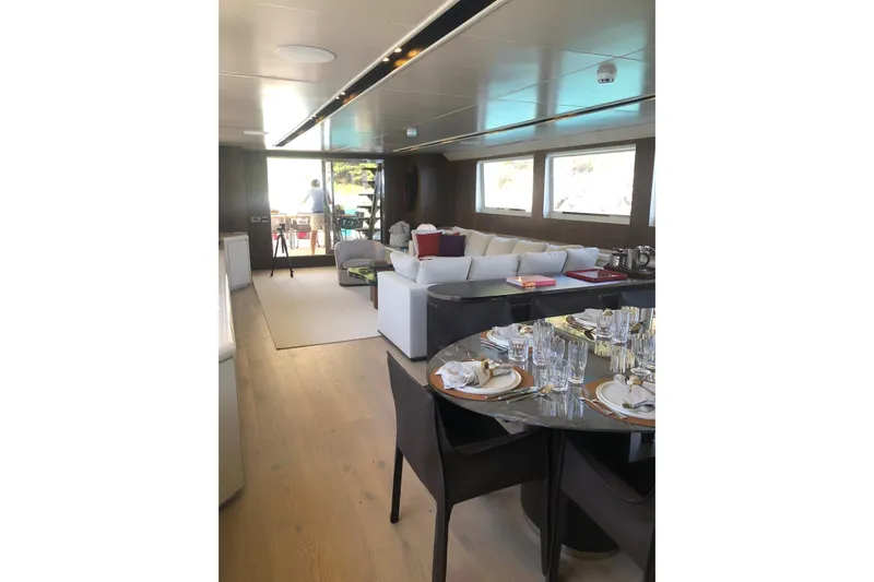 Axella Yacht Photos Pics Luxurious interior of 1991 Crestitalia 33m yacht with elegant dining and seating areas.
