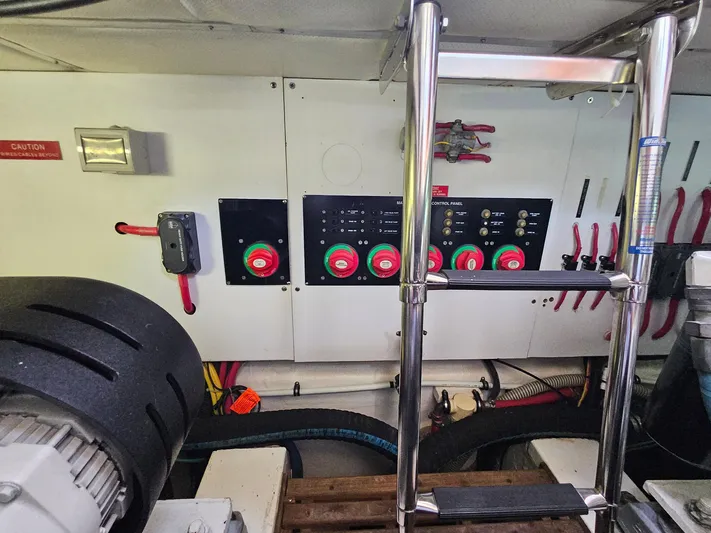 Journey Yacht Photos Pics Engine room of 2007 Grand Banks 39 Eastbay SX with control panels and equipment.