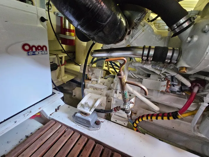 Journey Yacht Photos Pics Engine room of 2007 Grand Banks 39 Eastbay SX with Onan generator and mechanical components.