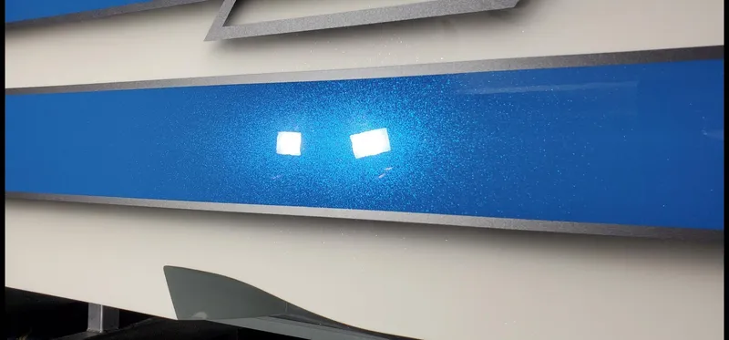 El Gato Yacht Photos Pics Close-up of MTI 390X 2022 model with blue metallic finish.