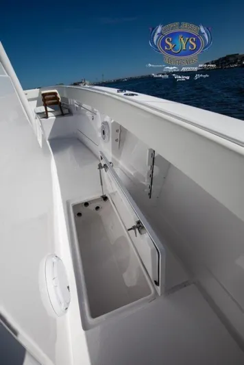  Yacht Photos Pics 2024 Jupiter 34 boat deck with storage compartments and ocean view