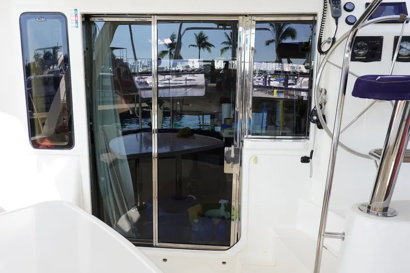  Yacht Photos Pics Interior view of a 2010 Leopard 40 catamaran with sliding glass doors.