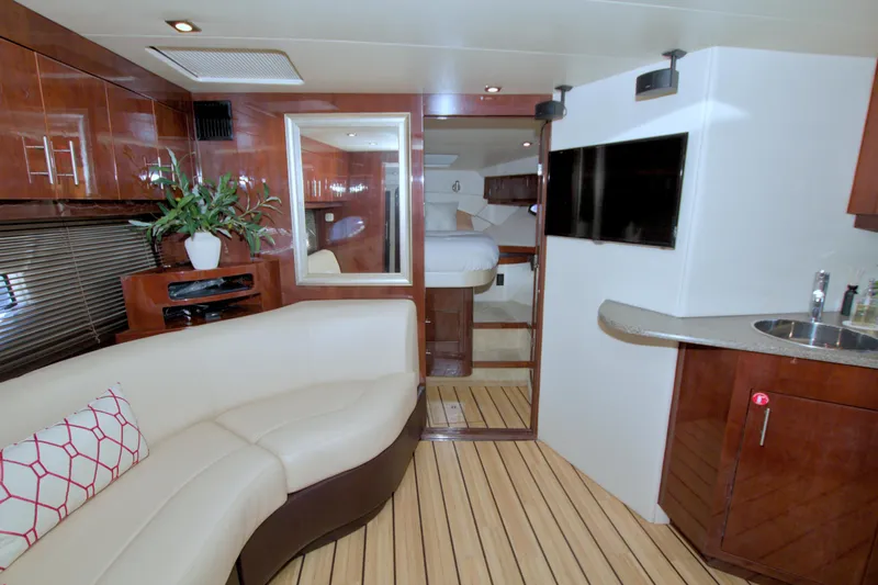 Serenity In The Sea Yacht Photos Pics Luxurious interior of 2014 Regal 46 Sport Coupe yacht with modern amenities.