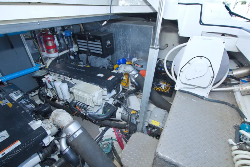 Serenity In The Sea Yacht Photos Pics Engine room of 2014 Regal 46 Sport Coupe with visible machinery and components.