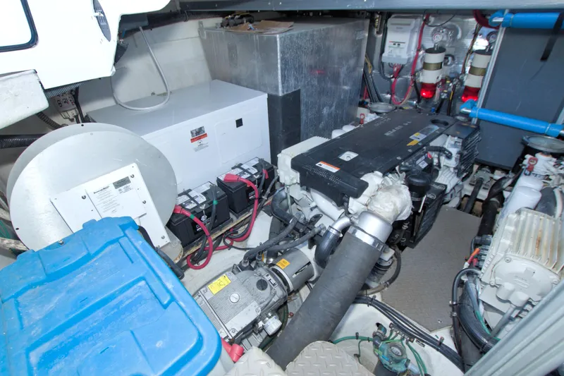 Serenity In The Sea Yacht Photos Pics Engine room of 2014 Regal 46 Sport Coupe with visible machinery and components.
