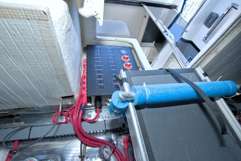 Serenity In The Sea Yacht Photos Pics 2014 Regal 46 Sport Coupe battery management system with red cables and blue insulation.