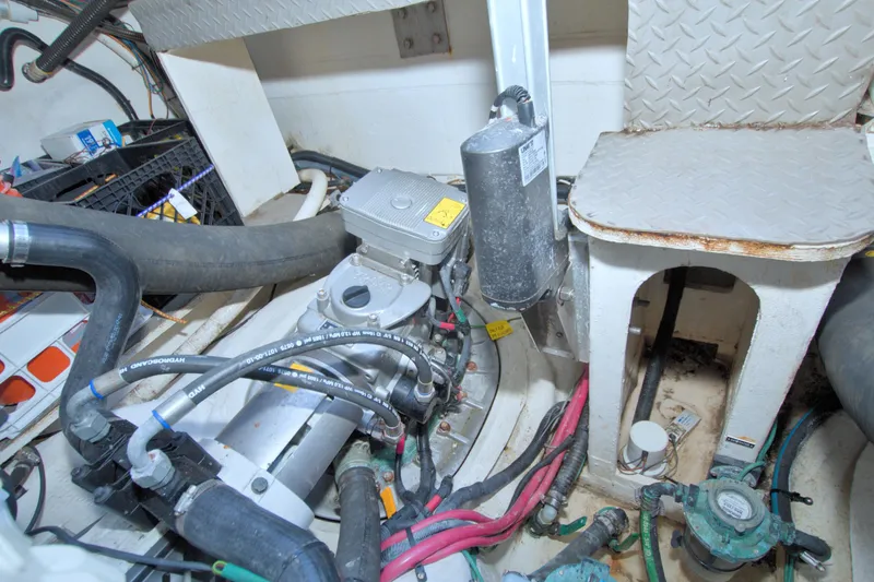 Serenity In The Sea Yacht Photos Pics Engine room of 2014 Regal 46 Sport Coupe with visible mechanical components.