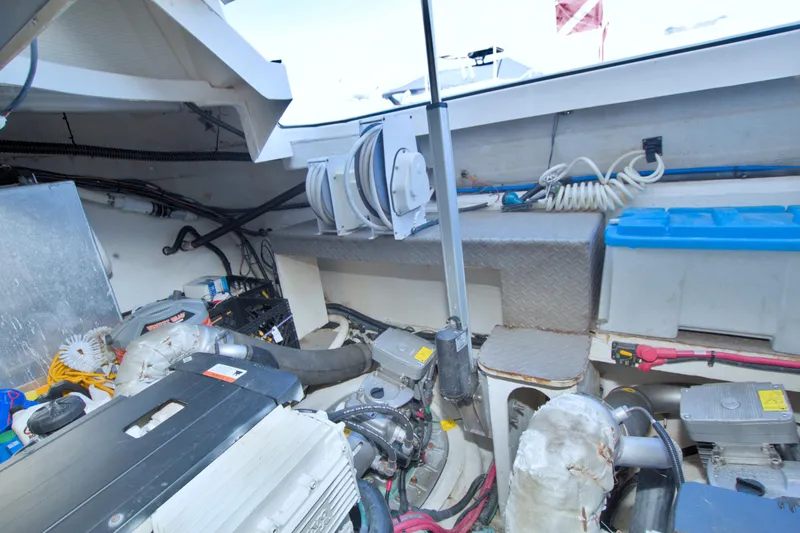 Serenity In The Sea Yacht Photos Pics Engine room of a 2014 Regal 46 Sport Coupe with visible machinery and equipment.