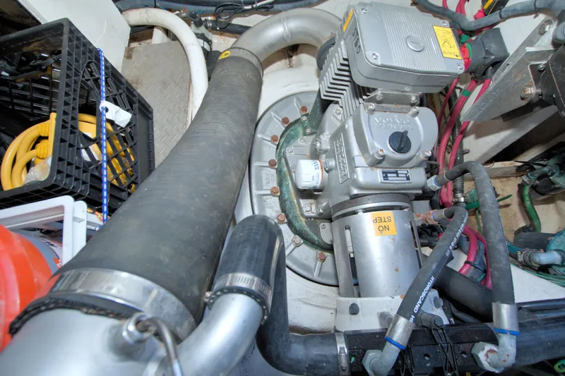 Serenity In The Sea Yacht Photos Pics Engine room of 2014 Regal 46 Sport Coupe with mechanical components and wiring.