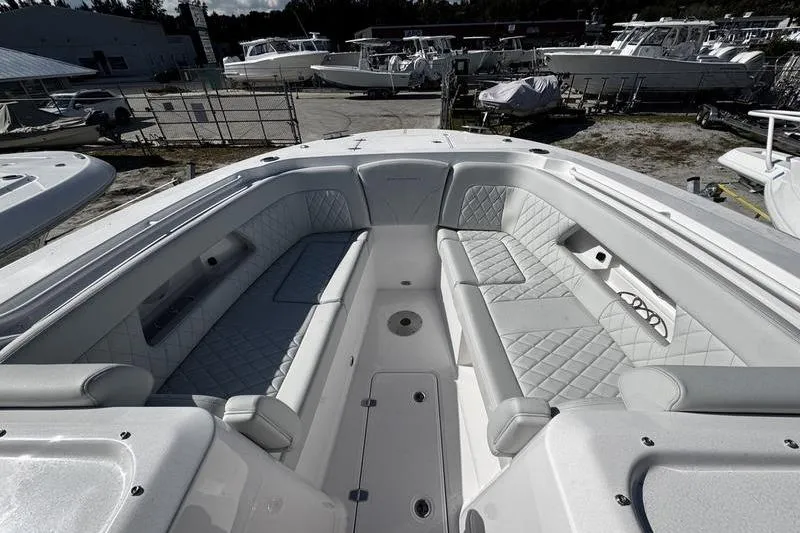  Yacht Photos Pics 2026 Southport 33 DC boat interior with luxurious seating and modern design.