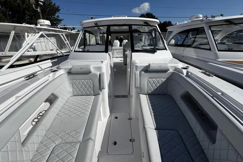  Yacht Photos Pics 2026 Southport 33 DC boat interior with luxurious seating and modern design.