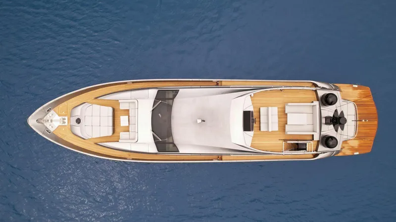  Yacht Photos Pics Aerial view of 2012 Pershing 92 luxury yacht on blue water.