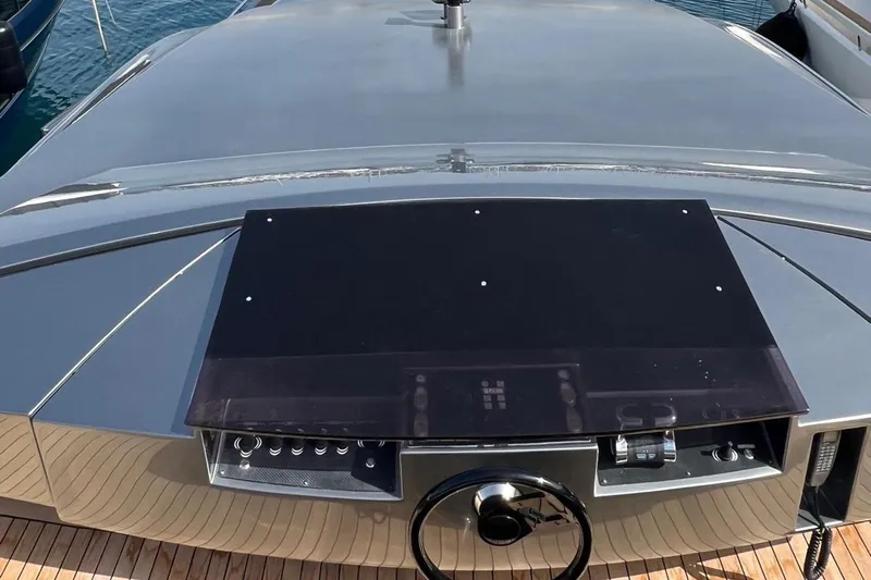  Yacht Photos Pics Helm of 2012 Pershing 92 yacht with sleek design and modern controls.