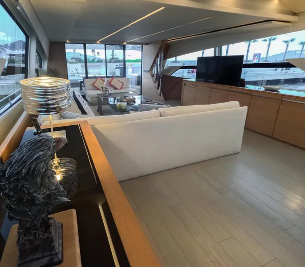 Yacht Photos Pics Luxurious interior of a 2012 Pershing 92 yacht with modern decor and large windows.